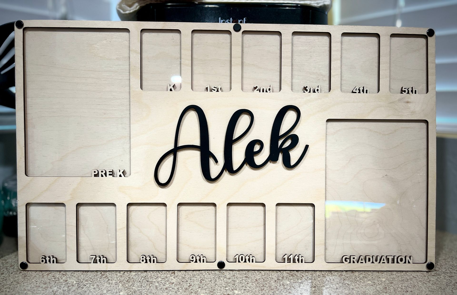 Wooden photo display board with 