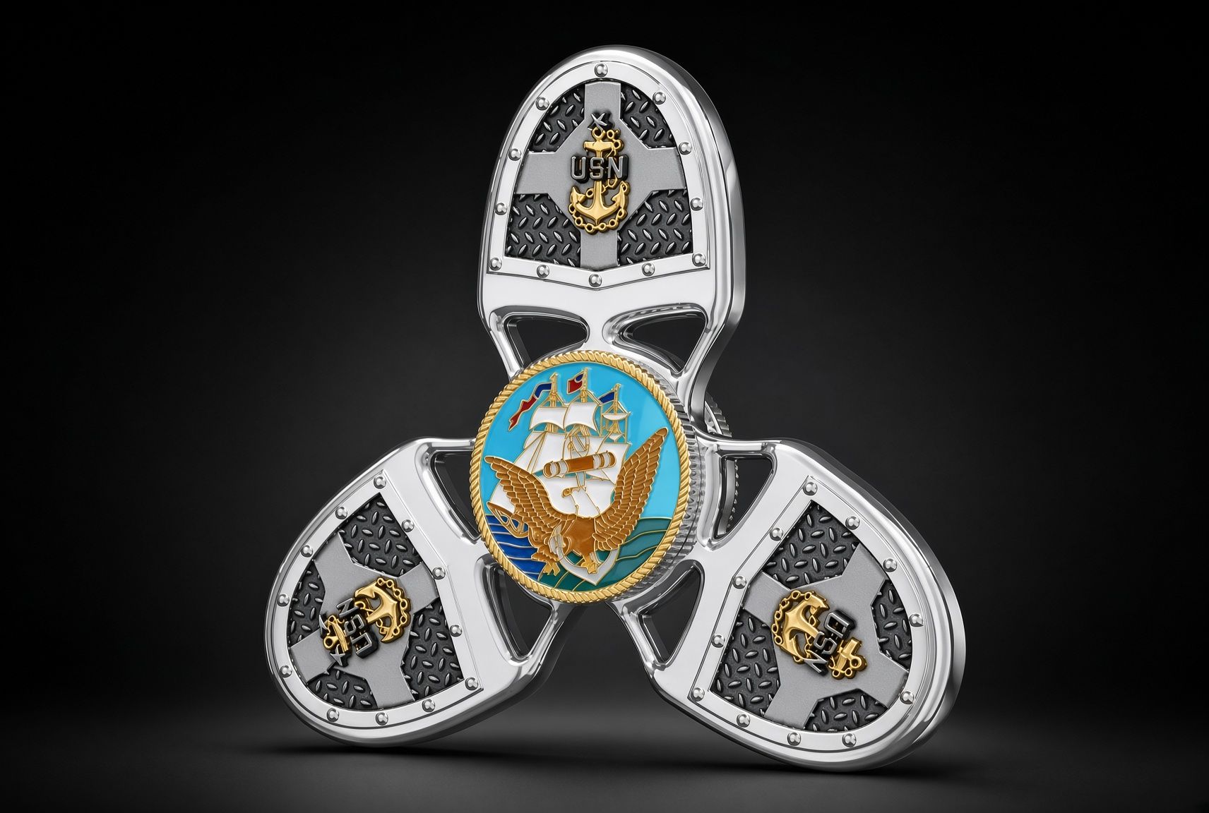 Tri-lobed silver fidget spinner with gold-and-blue center on a black background