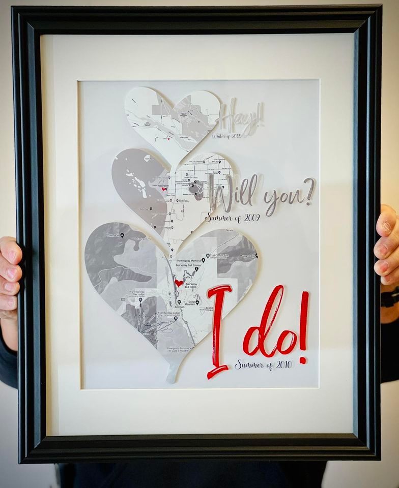 Framed artwork: three heart-shaped maps, 