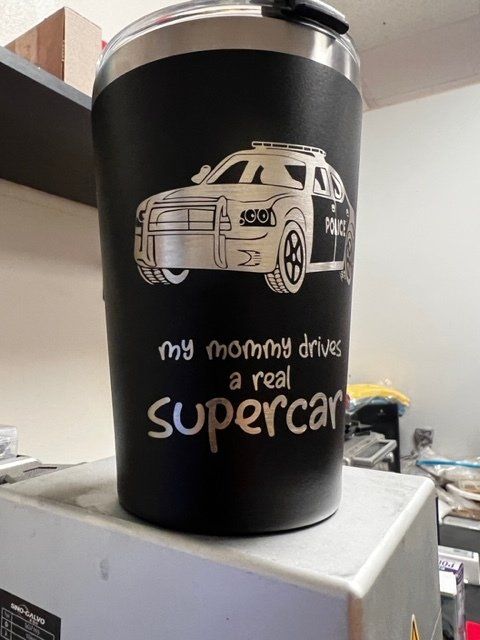 Black tumbler with police car graphic and text: 