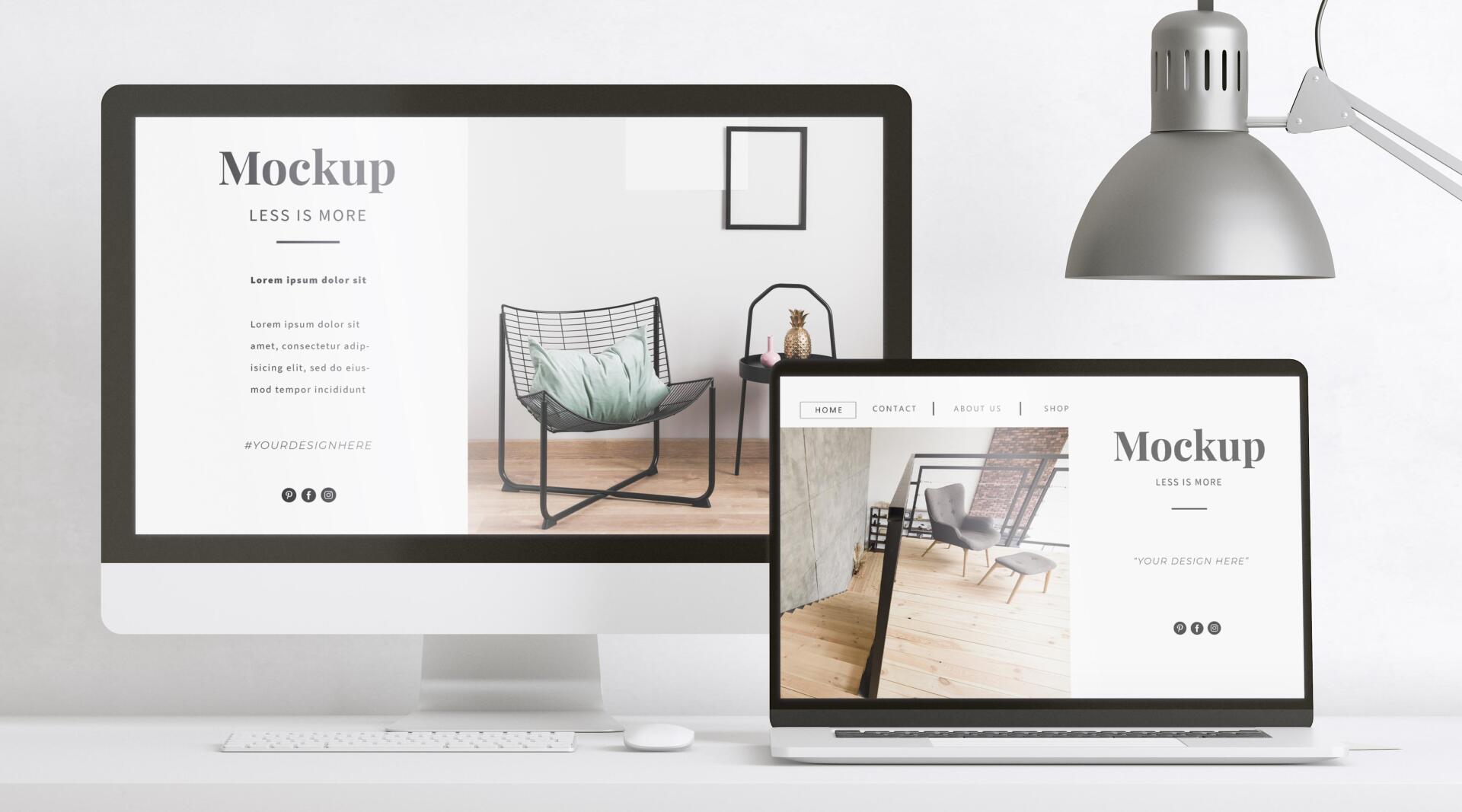 Desktop and laptop displaying minimalist website mockups on a white desk with a silver lamp