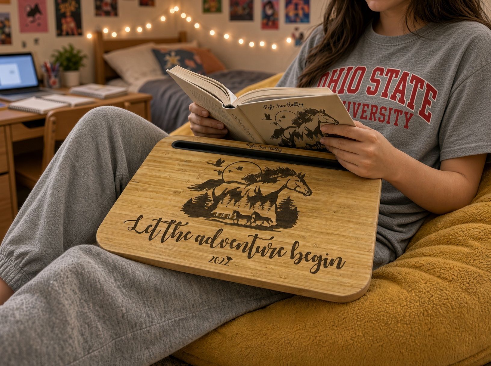 Wooden cutting board engraved with horses and birds above “Let the adventure begin” and “XOXO”