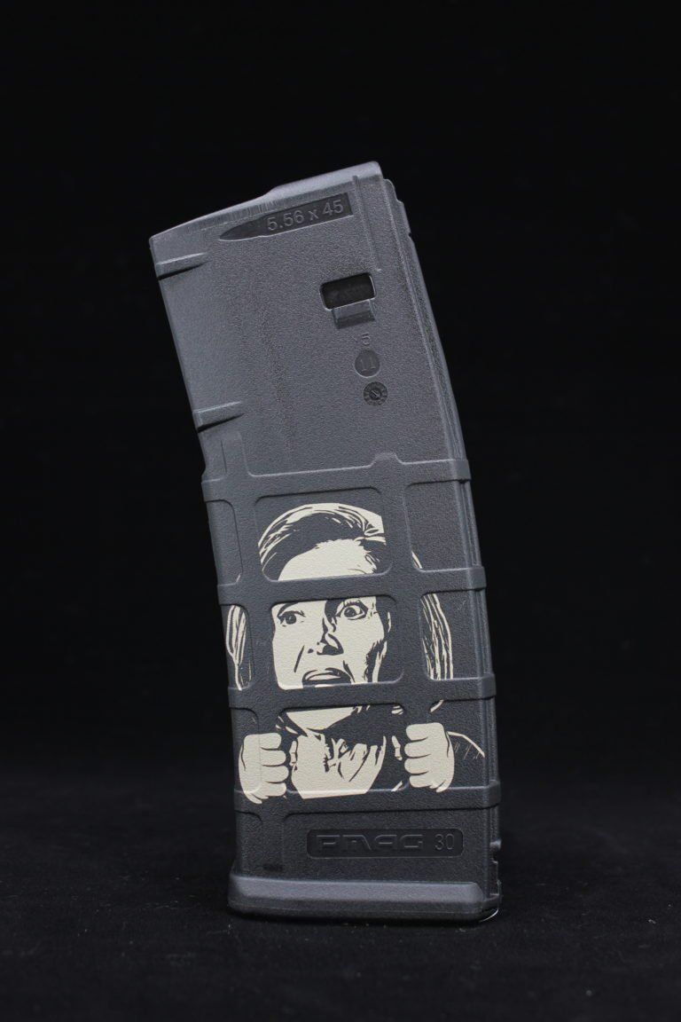 Black rifle magazine with illustration of a person behind bars.