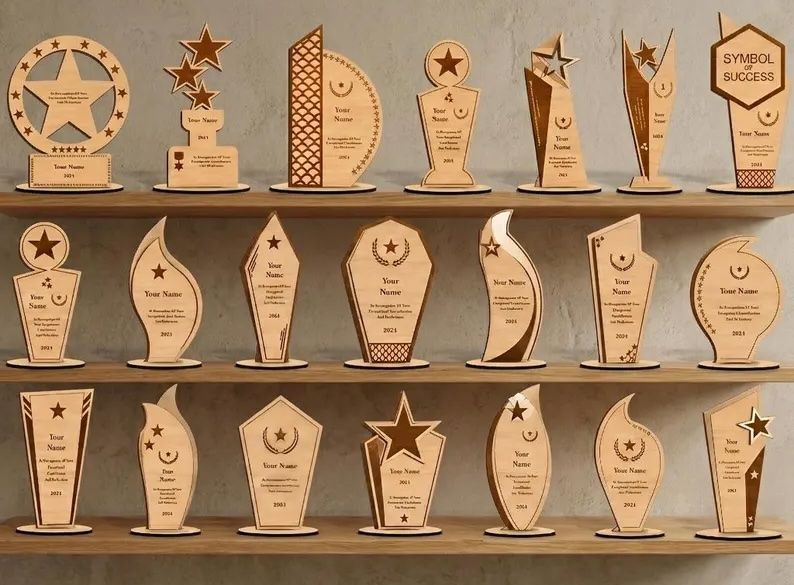 Shelves of wooden award trophies with star and flame designs displayed in rows