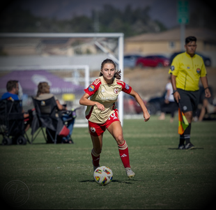 A soccer player for Magnus Football Club
