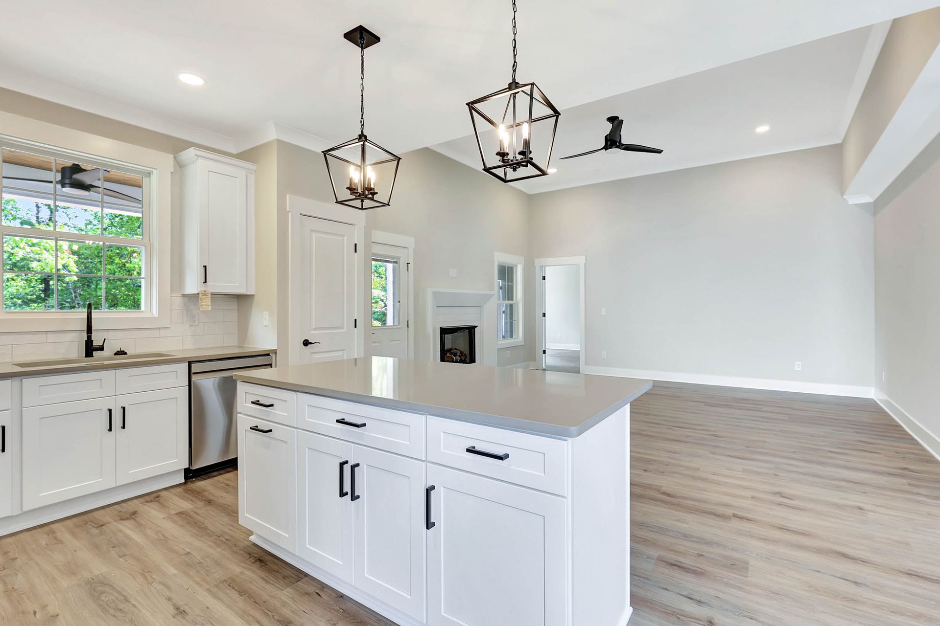 There is a large island in the middle of the kitchen.