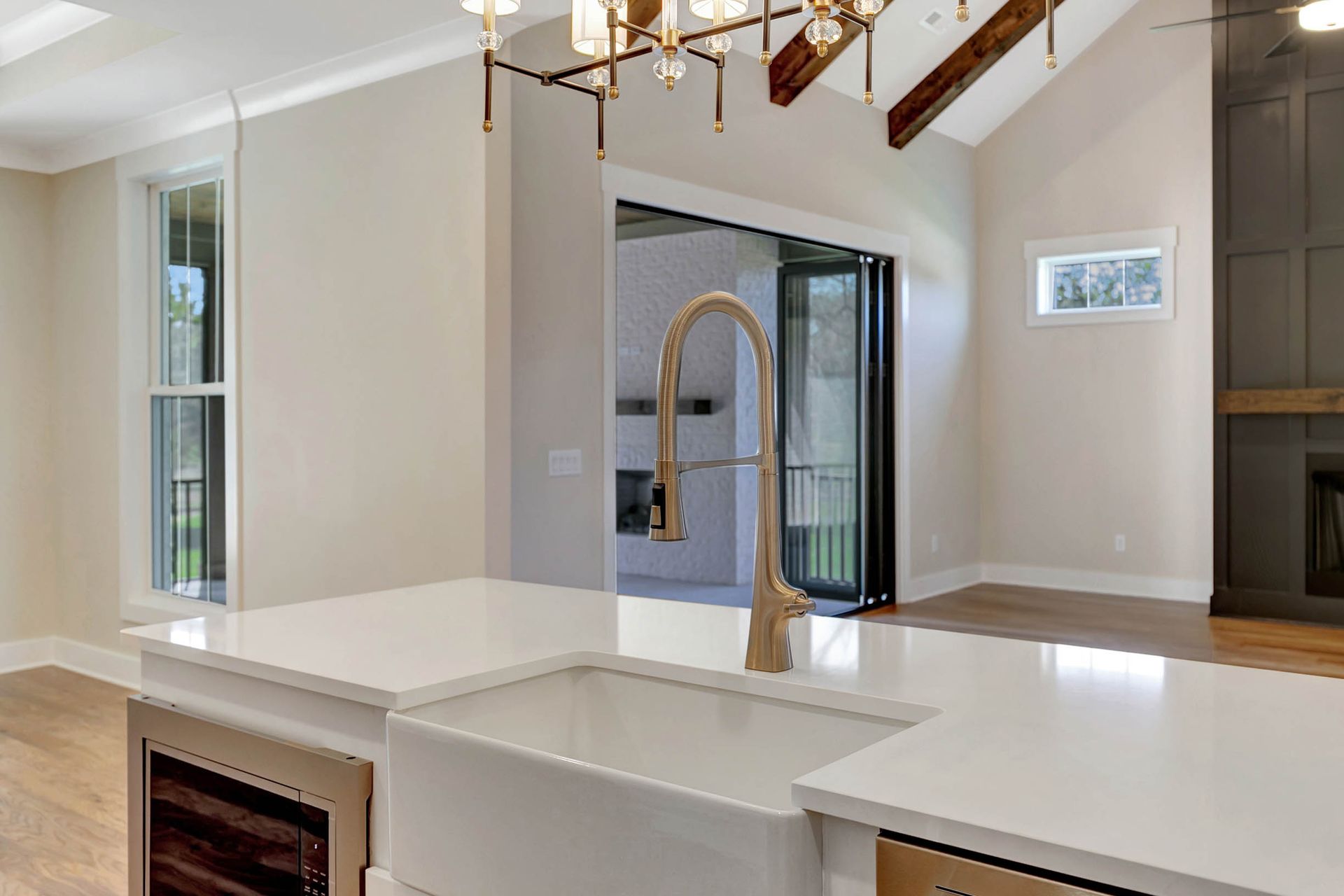 A kitchen with a sink and a faucet in it.