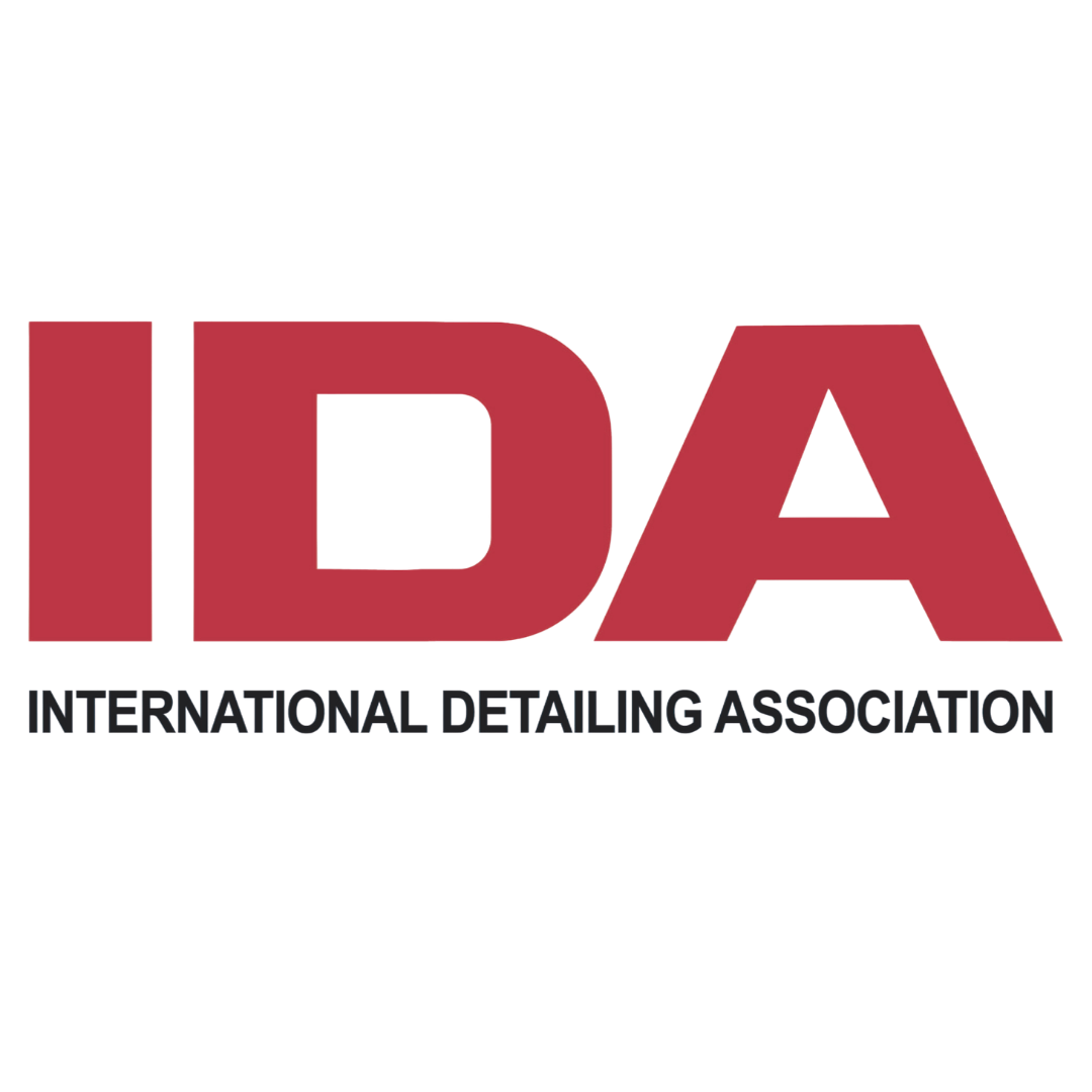 IDA International Detailing Association member certified detailer badge with red, black, and white text