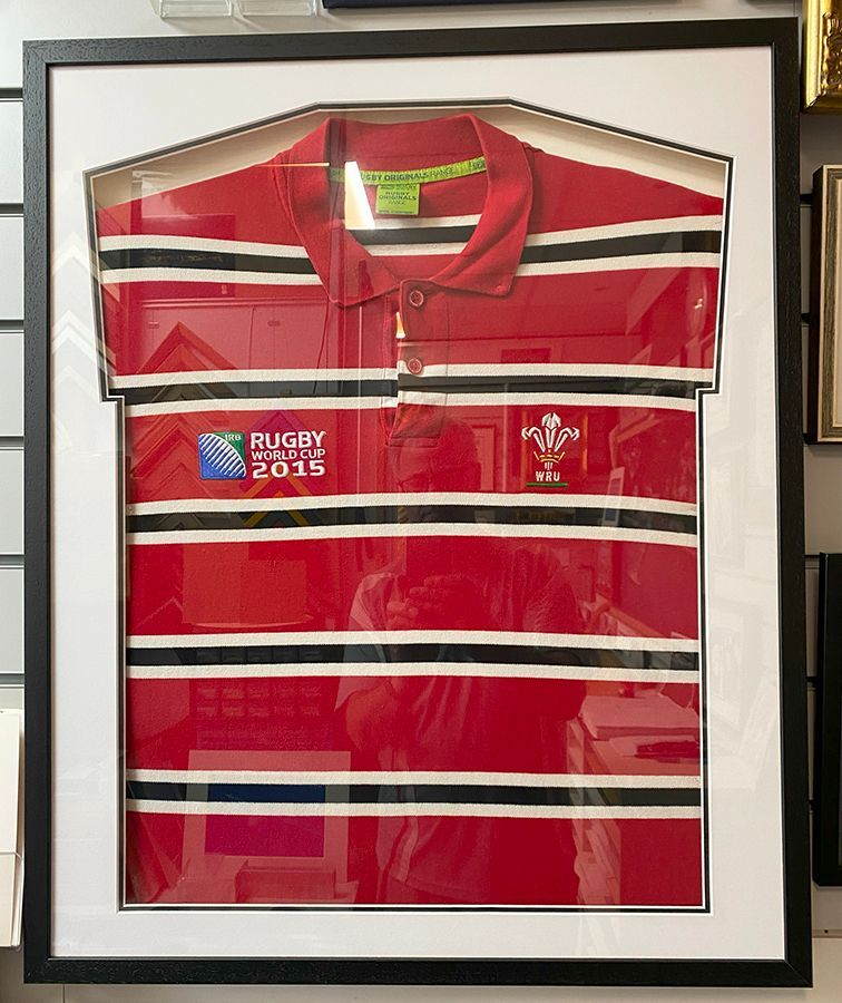 Shirt framed with shaped mount