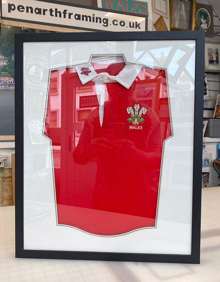 Shirt framed with shaped mount