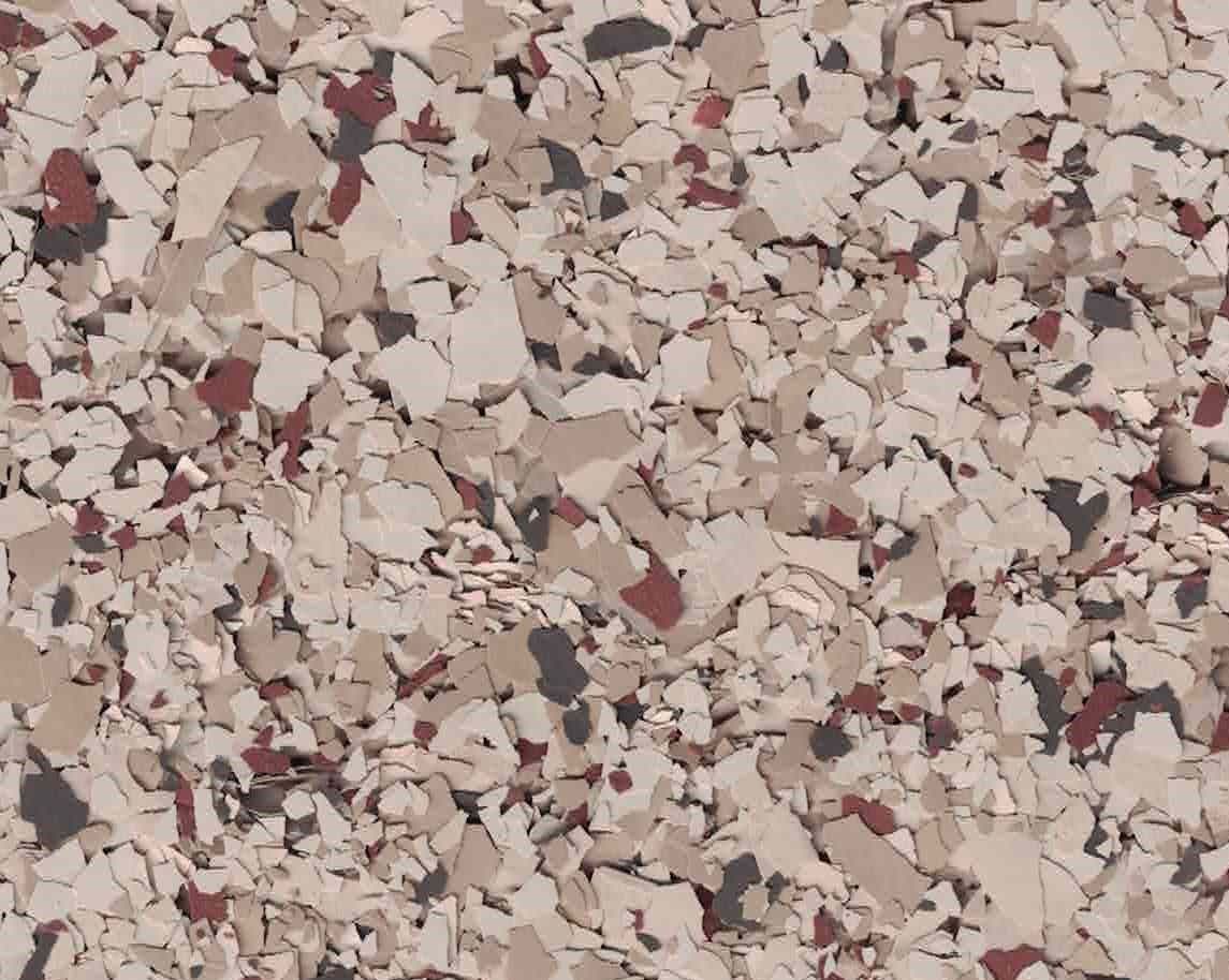 Close-up of pink, beige, and gray crushed stone or gravel texture