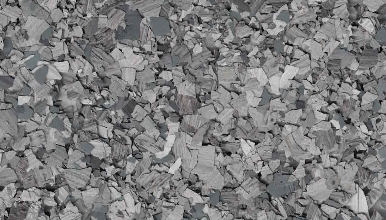 Pile of gray crushed stones or gravel filling the frame