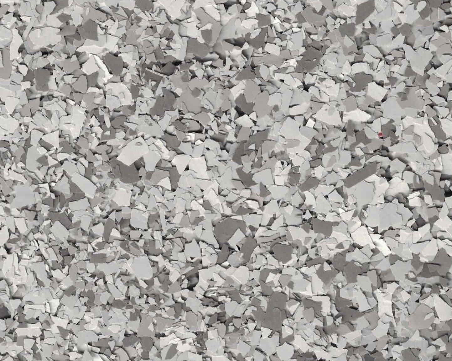 Gray and white speckled stone chips filling the frame