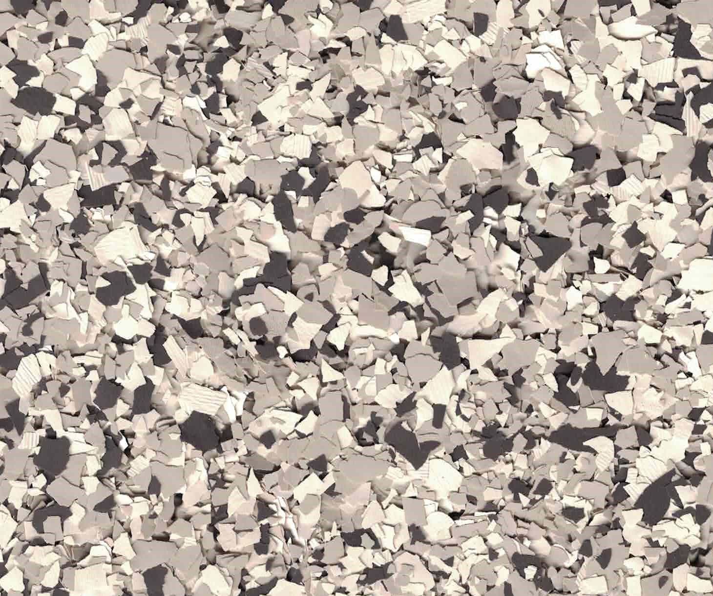 Abstract pattern of small gray, beige, and white pebbles or mosaic stones