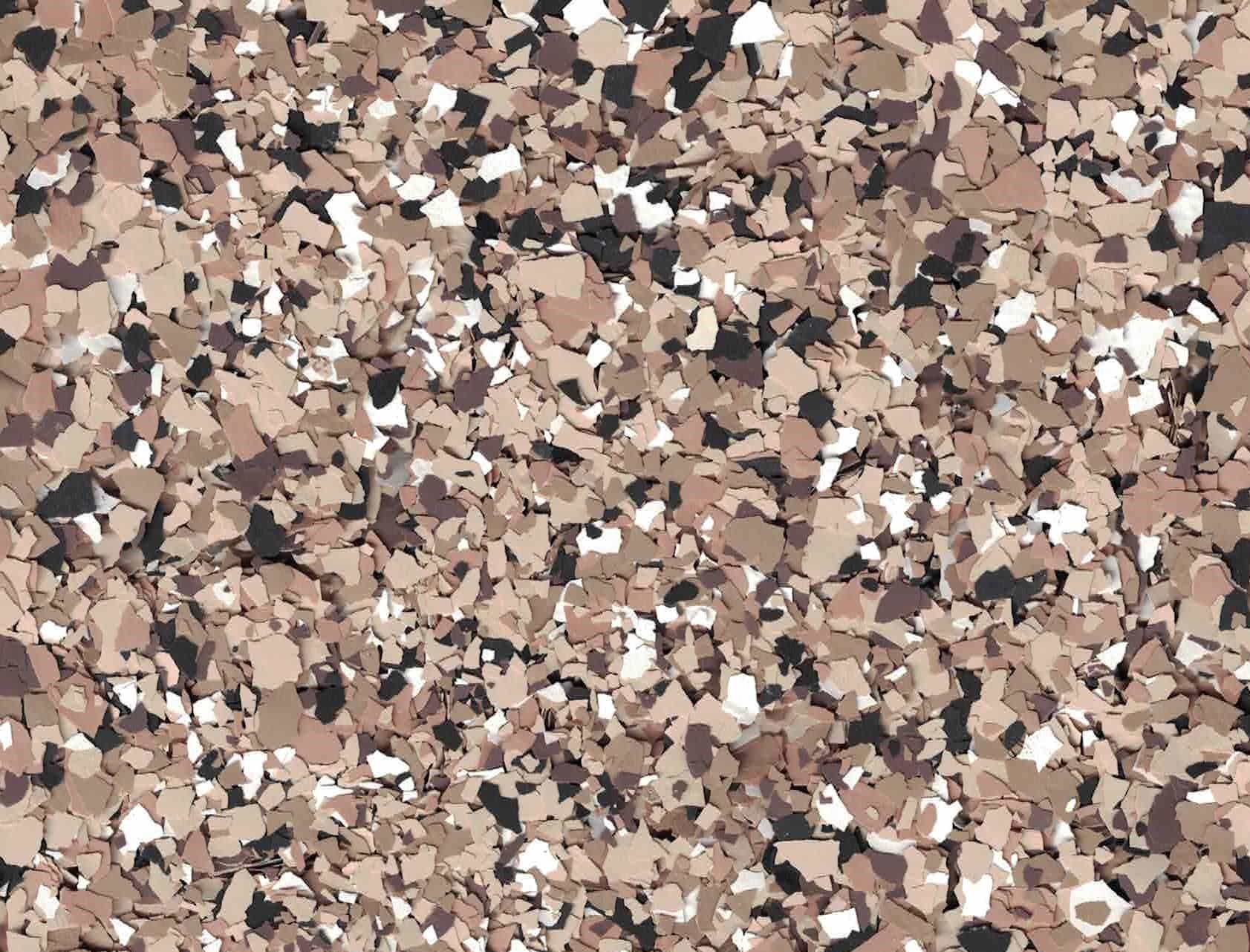 Close-up of speckled beige, brown, black, and white stone or terrazzo texture