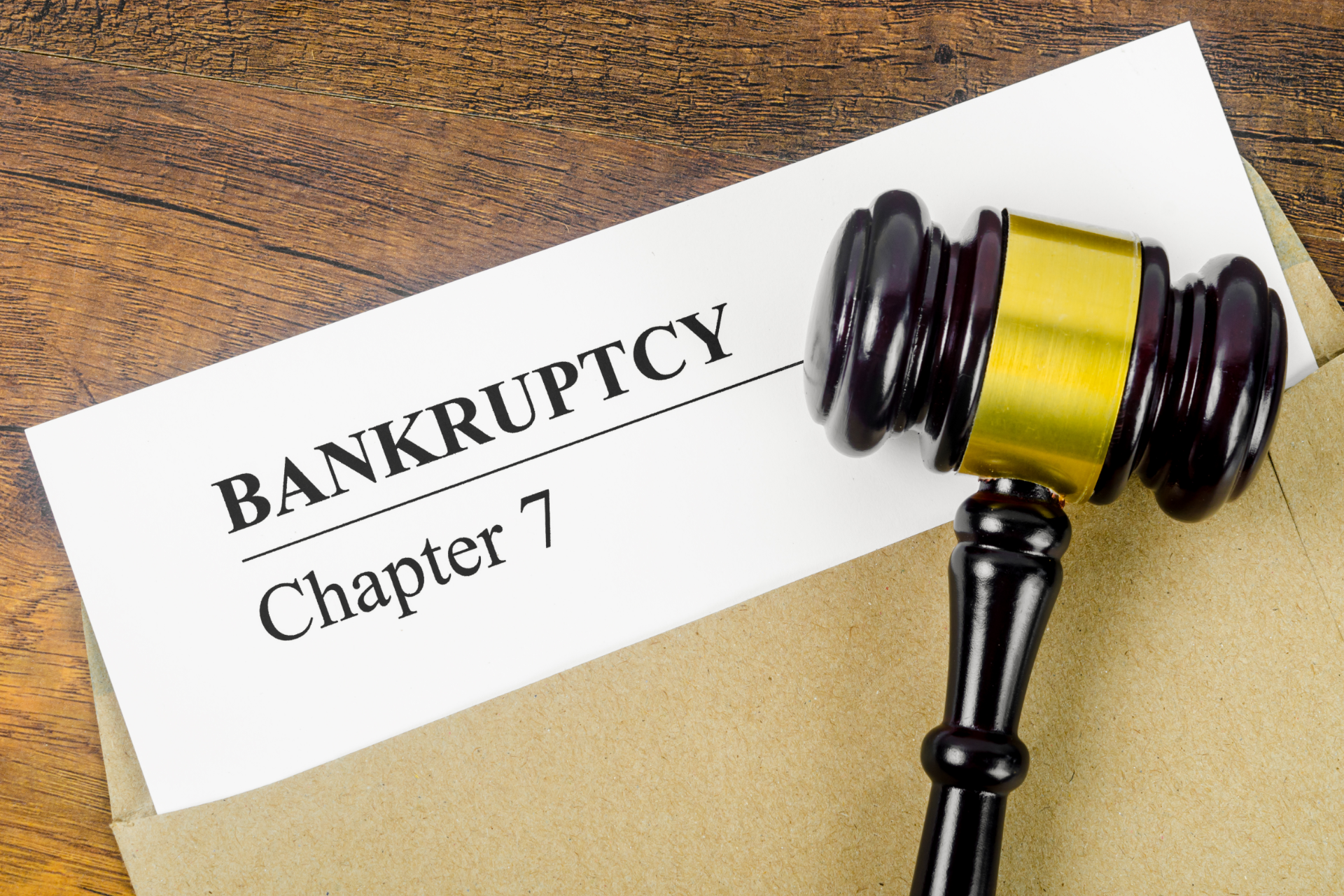 Bankruptcy Chapter 7 notice with a judge’s gavel on a desk
