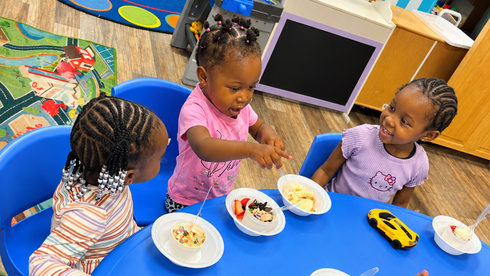 Toddlers learning with colorful shapes