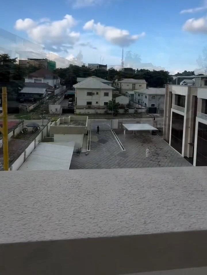 A view of a city from a balcony of a building