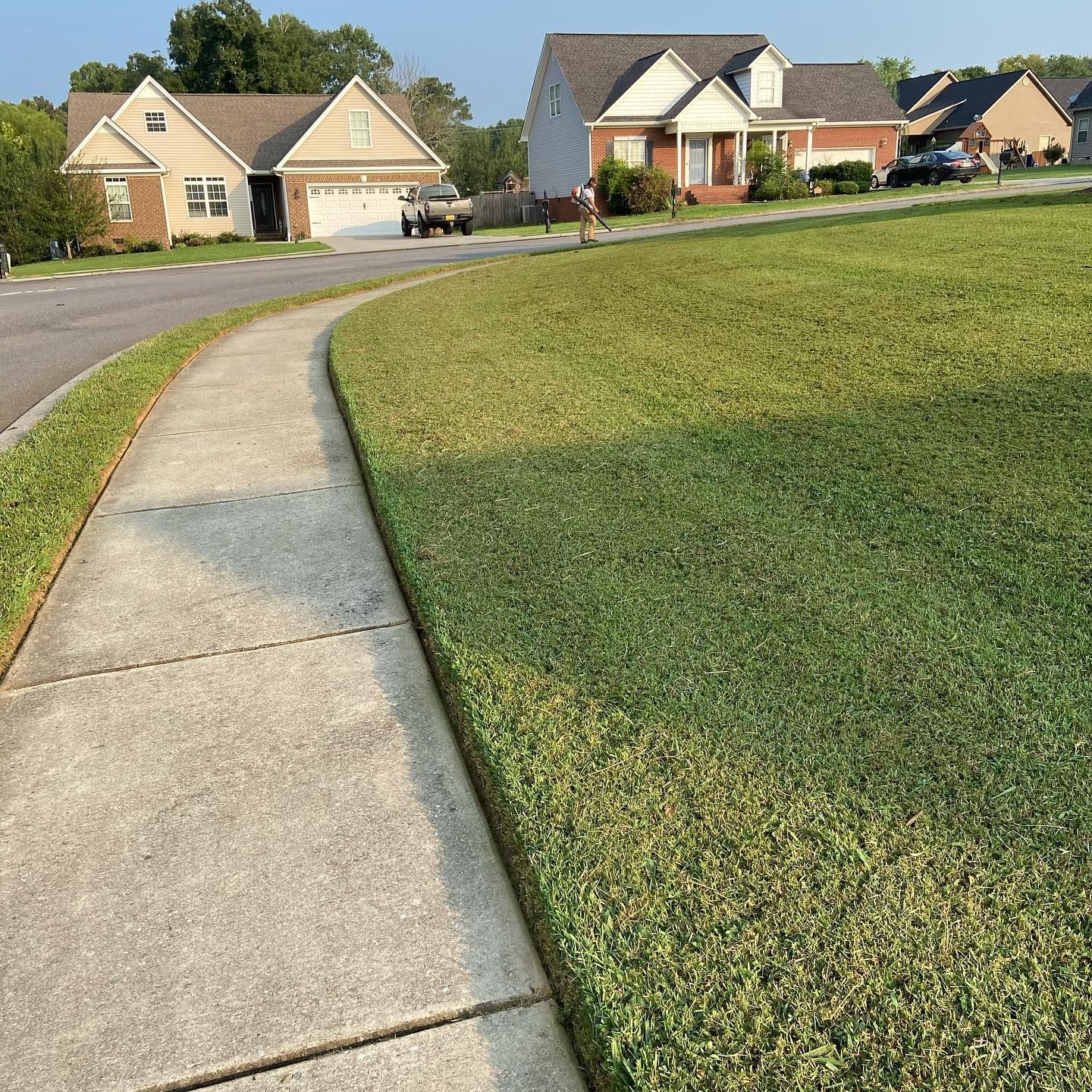 Clean lawn edging along sidewalks and driveways