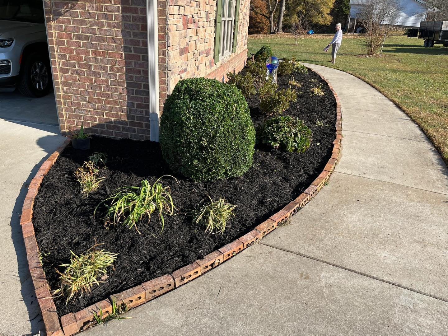 Front yard landscaping transformation by Stripes and Edges