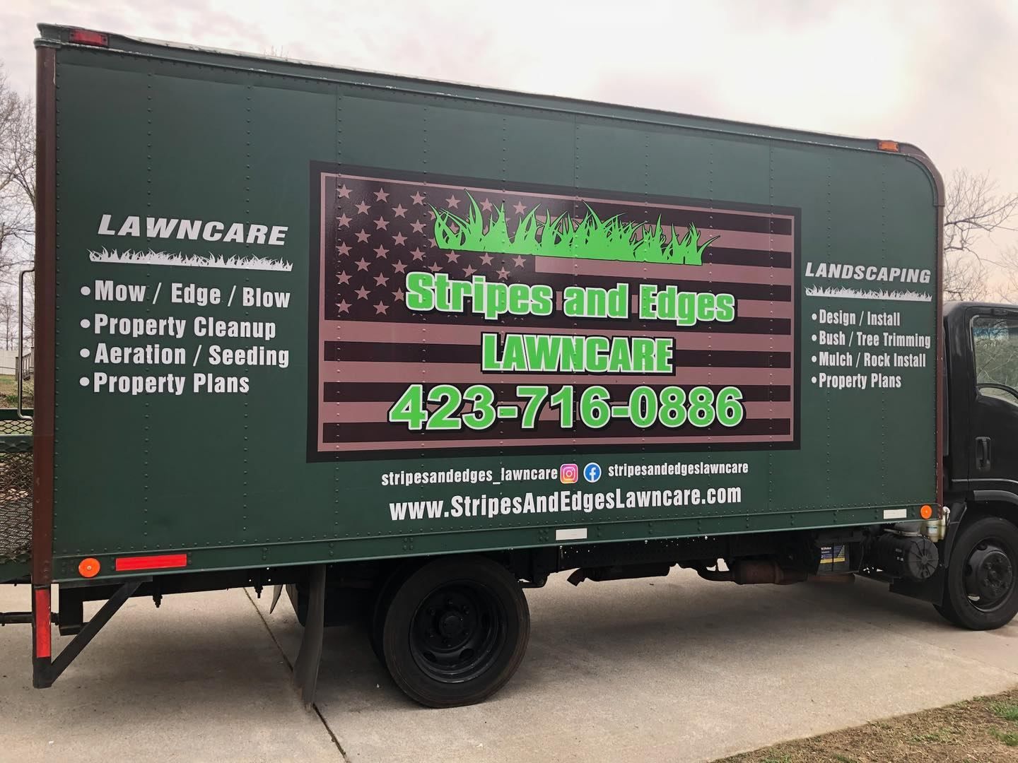 Stripes and edges lawn care and landscaping company logo on truck 