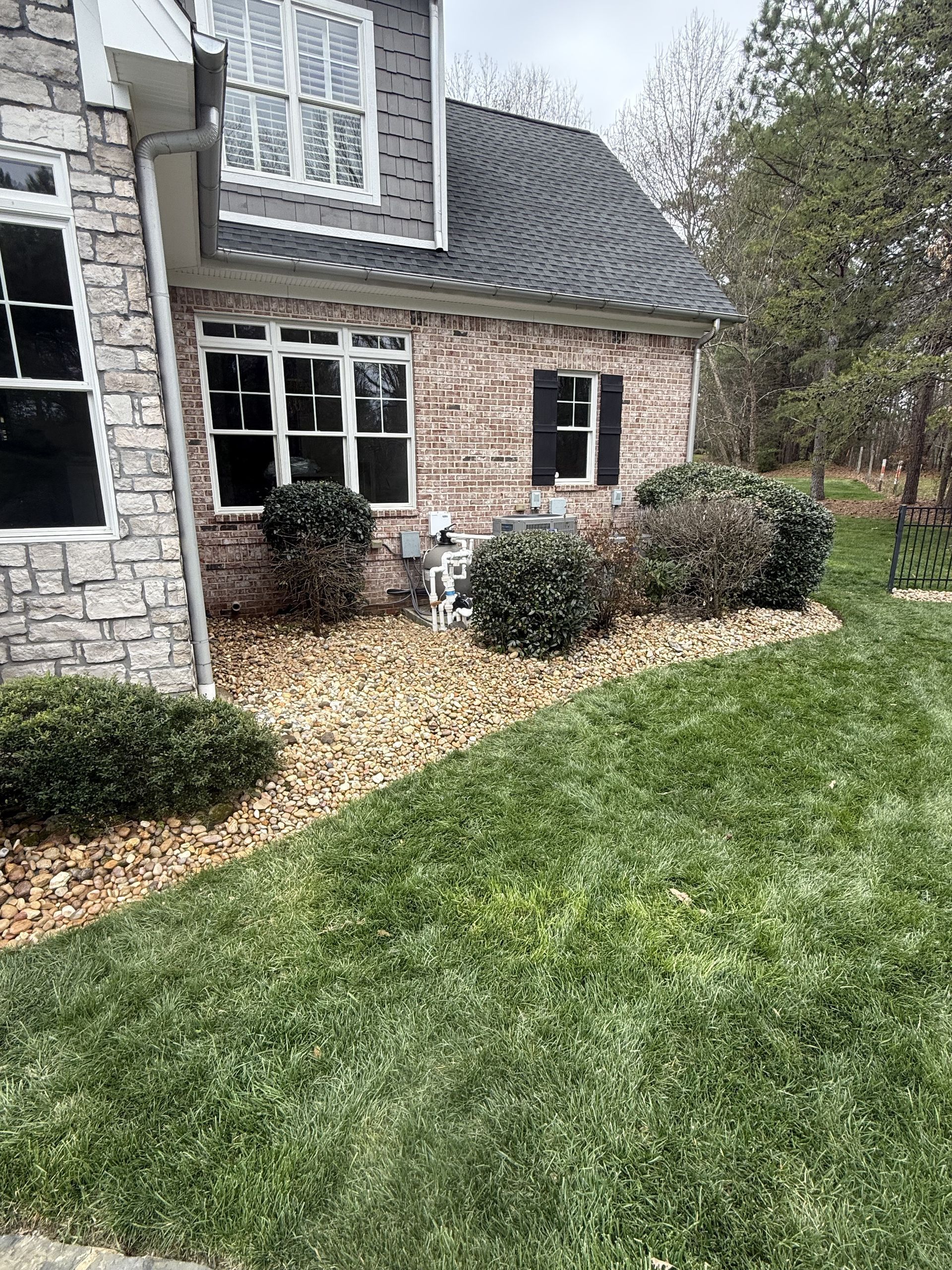 installing rock in a landscape bed 