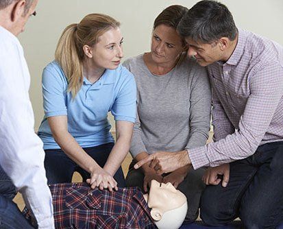 Team practicing CPR