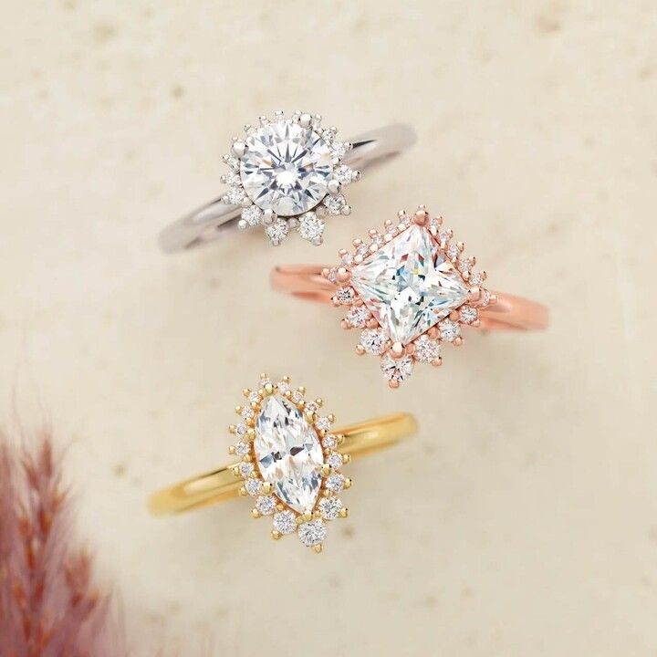 Three rings are sitting on top of each other on a table.