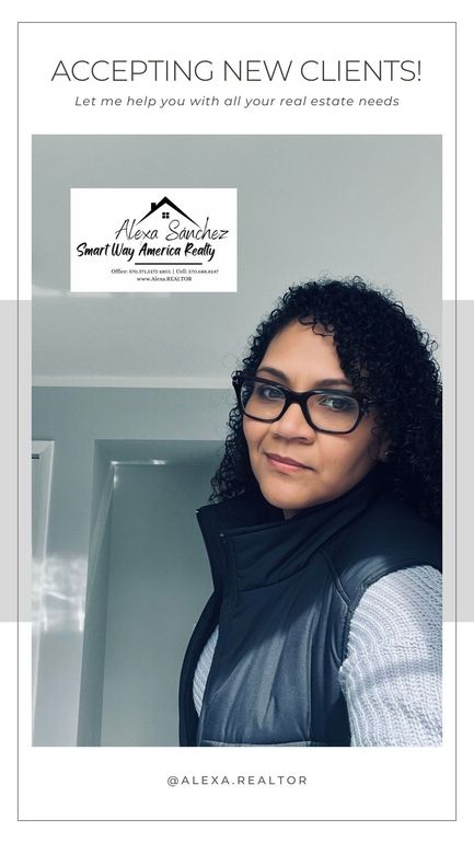 Portrait of a woman with glasses in a gray doorway, with “ACCEPTING NEW CLIENTS!” text above