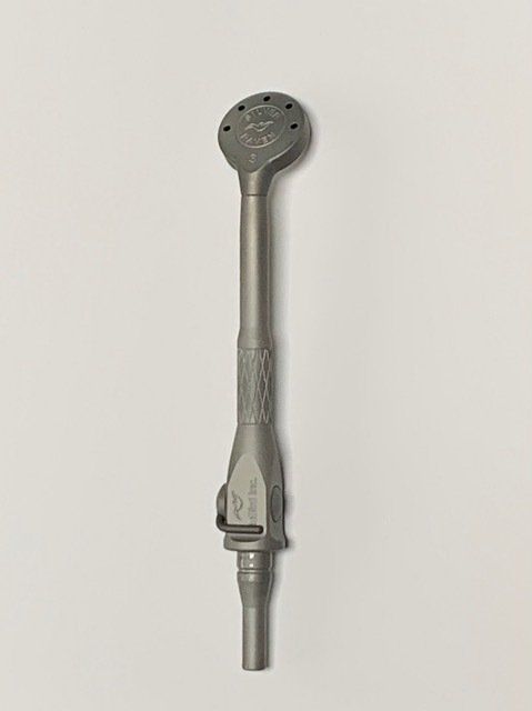 A grey, ornate medieval-looking wand or scepter. Has a round top with holes, a decorative handle and a clasp.