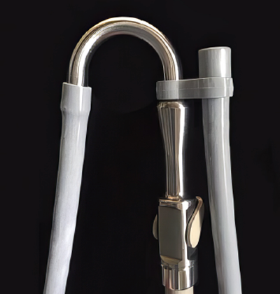 Curved metal fitting with Nu-bird hose in HOSE REST