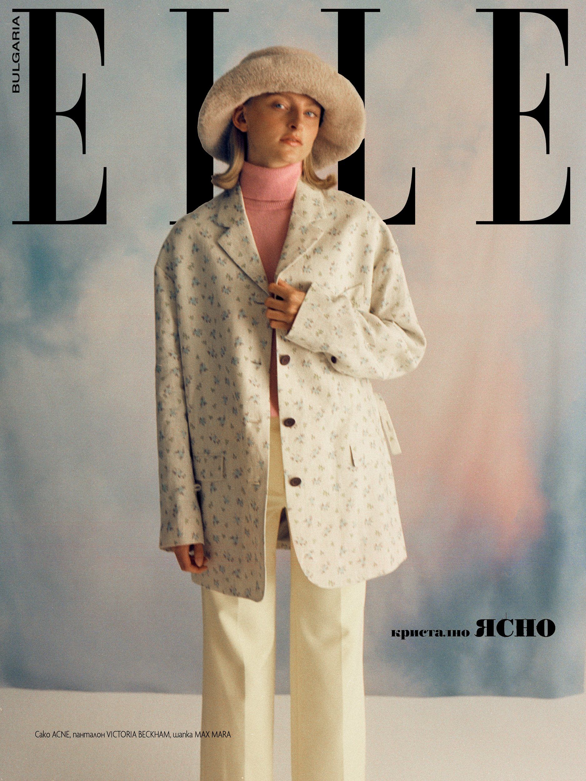 Titelseite des Elle-Magazins: Eine blonde Frau in geblümtem Mantel und Hut. Pastellfarbener Hintergrund.