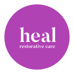 Purple circle logo with white text reading “heal” and “restorative care”