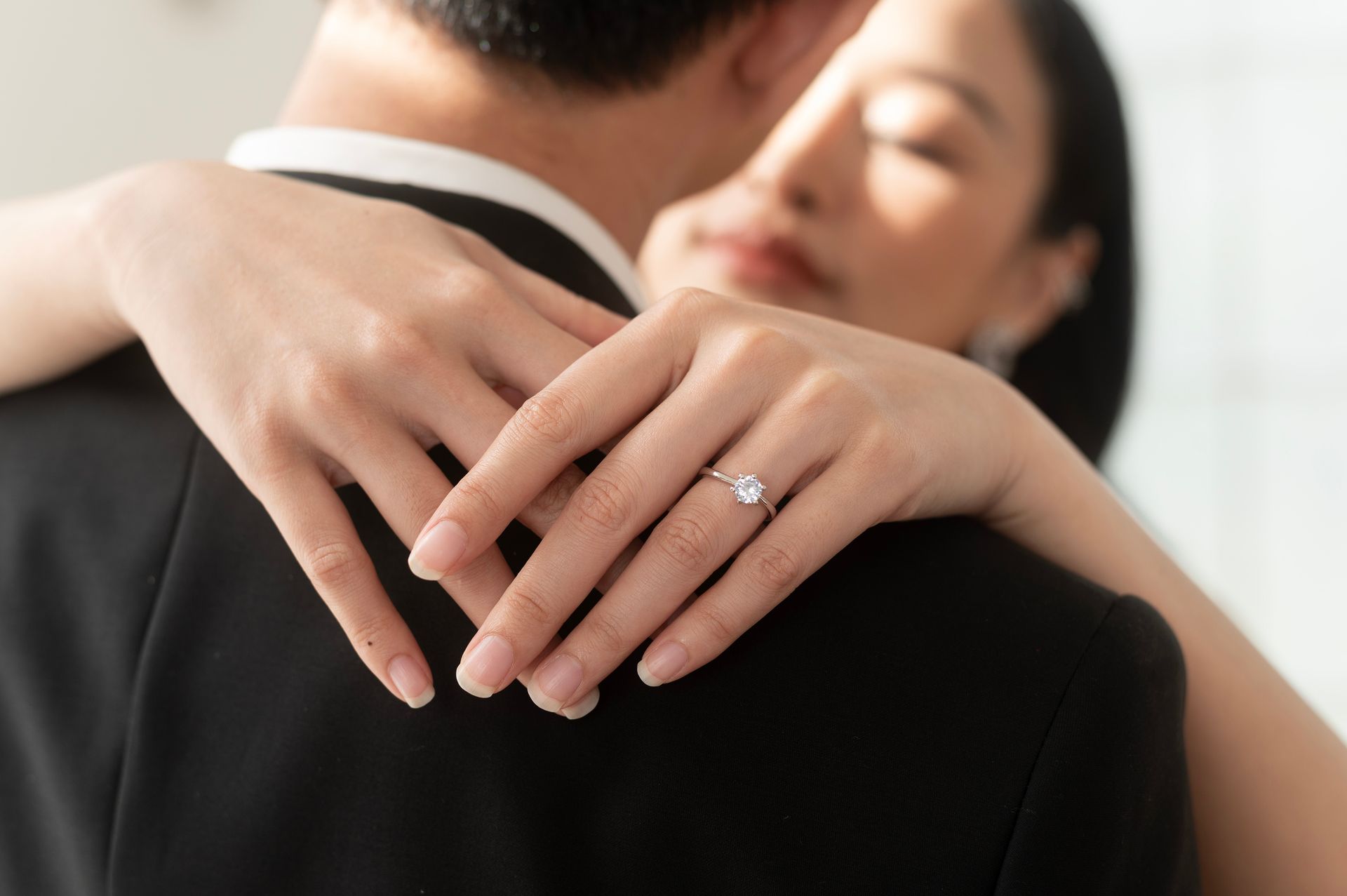 Close-up of an elegant wedding ring on the bride's finger