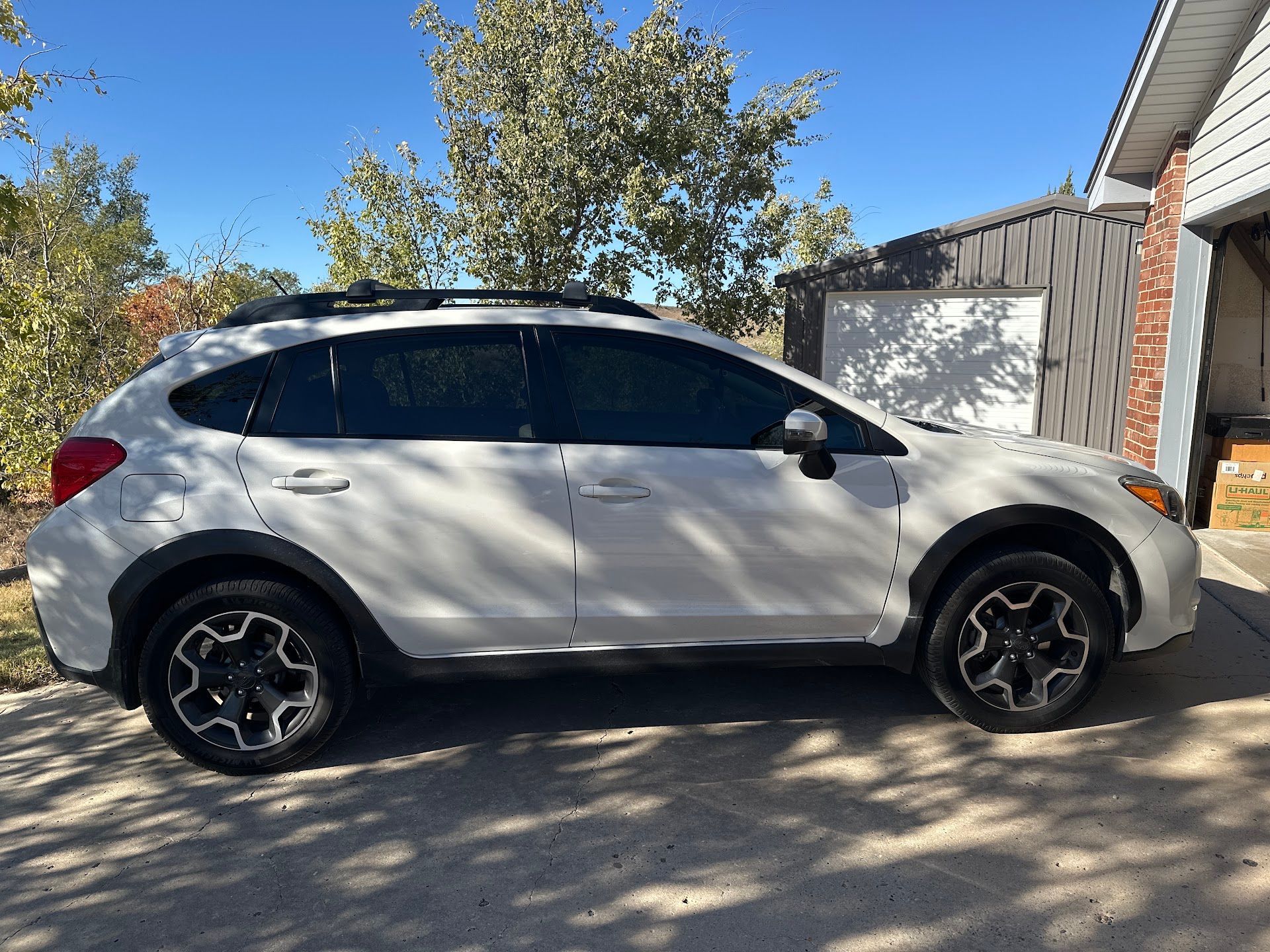 White Crossover SUV Parked Outside The Auto Repair Shop | TLC Automotive