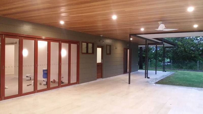 A Large Patio With a Lot of Windows and a Ceiling Fan — Darwin Glass in Yarrawonga, NT