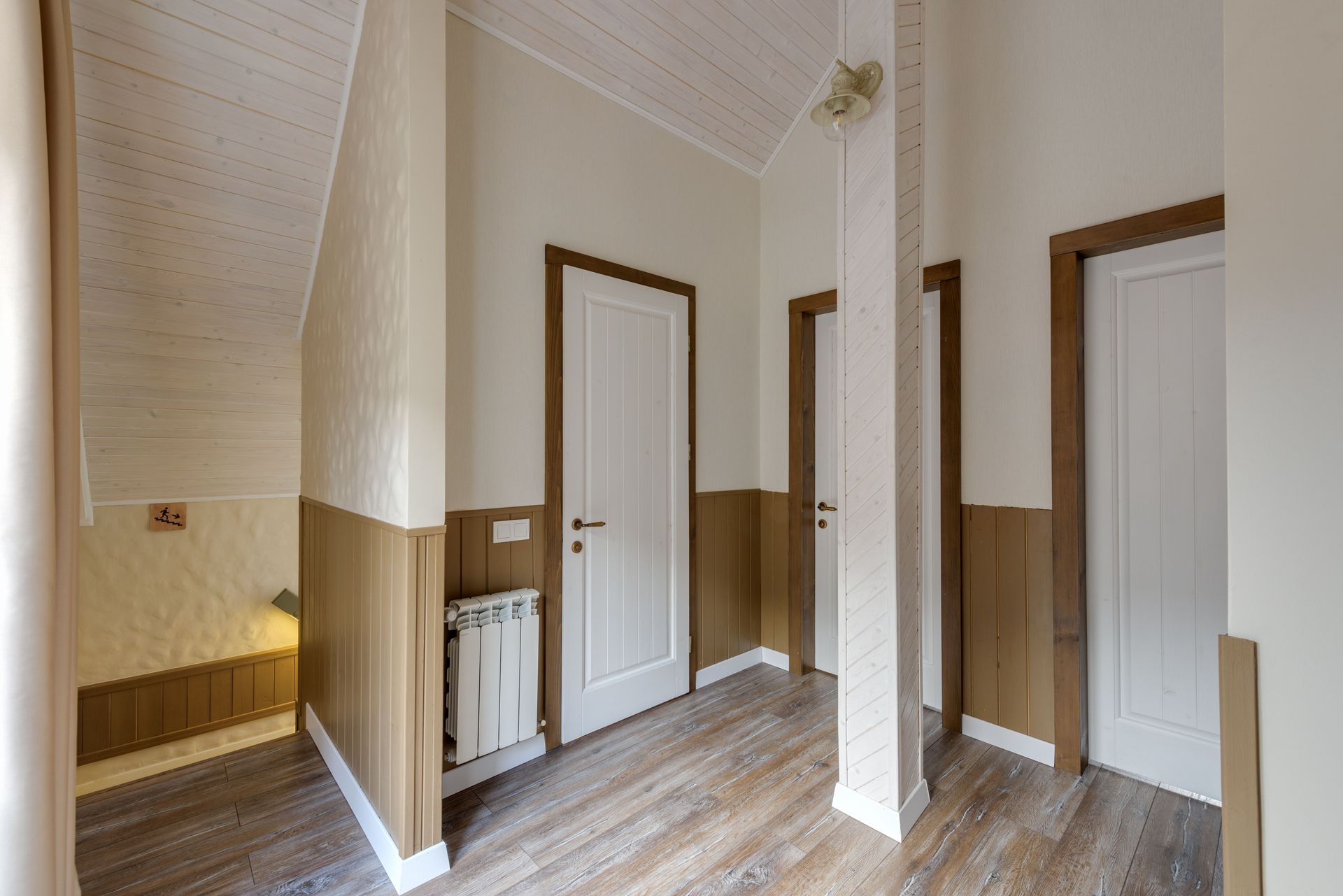 Hallway with a wood-effect floor