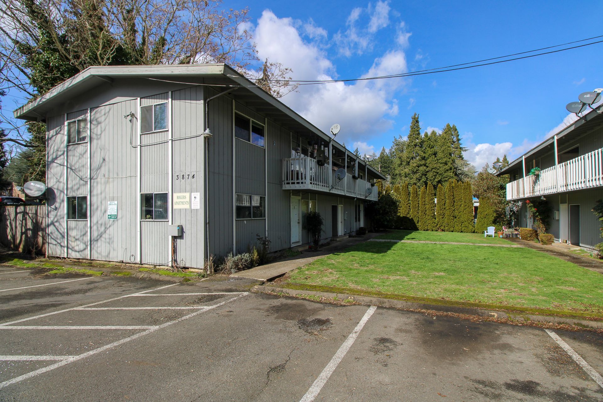 A building with a parking lot in front of it