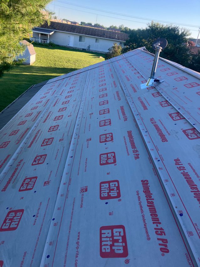 Wisconsin home with new asphalt shingle roof