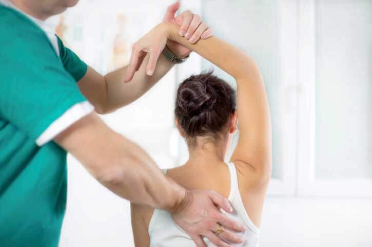 chiropractor performing adjustment