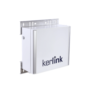 White Kerlink device mounted on a metal bracket. The device is rectangular with the Kerlink logo on its front.