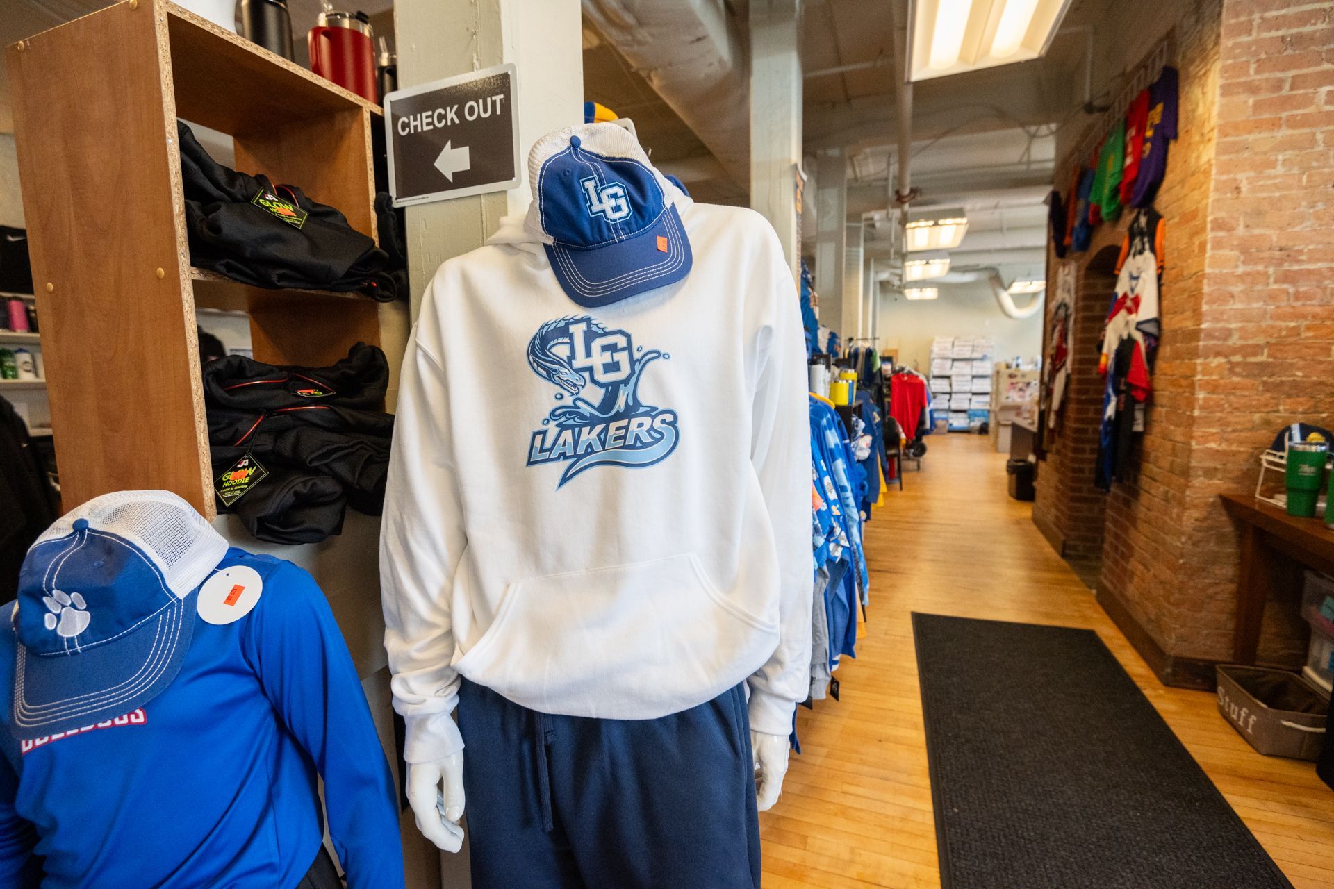 A mannequin wearing a sweatshirt with the number 16 on it
