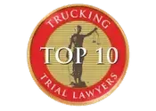 A circular red and gold logo with a silhouette of Lady Justice, reading "TRUCKING TOP 10 TRIAL LAWYERS."