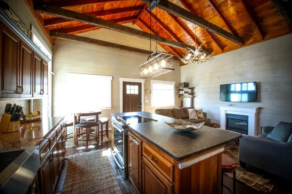 A kitchen with a large island in the middle of the room.