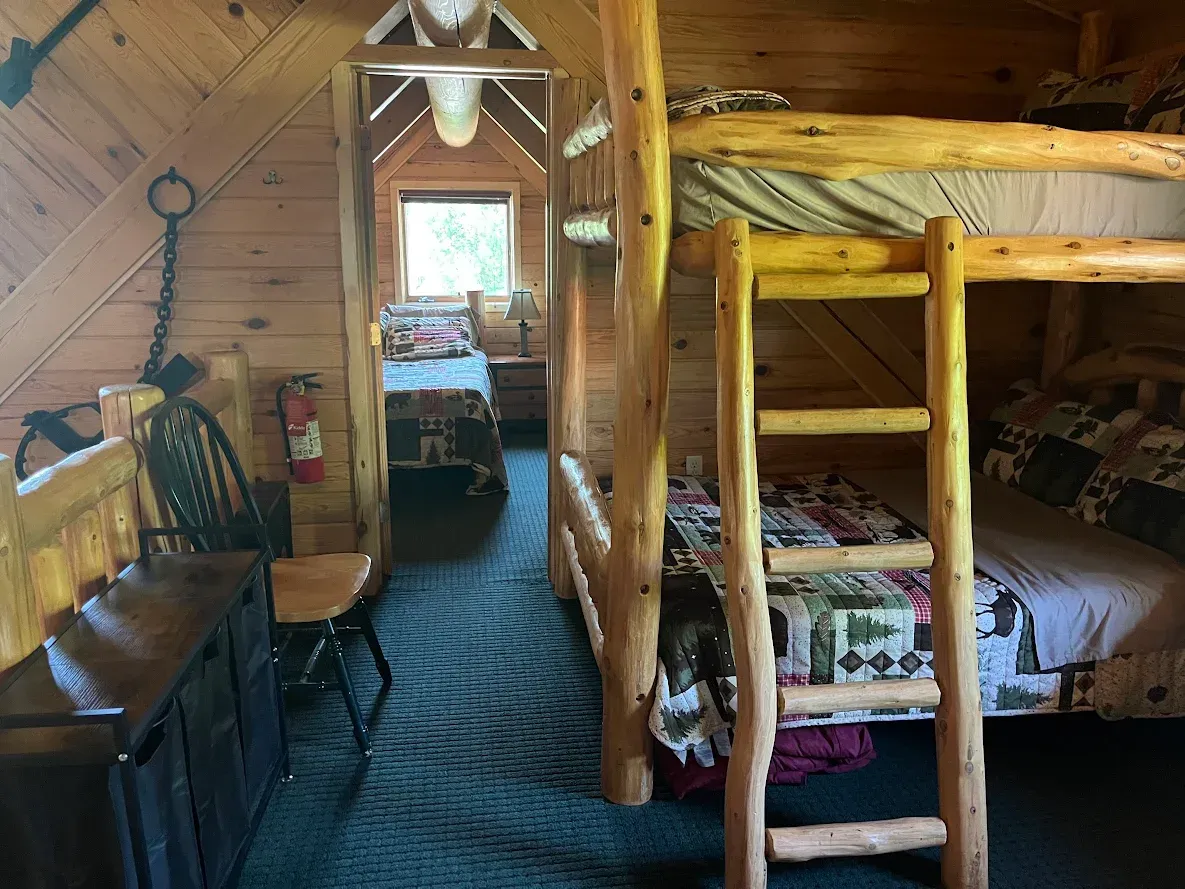 An aerial view of a living room in a log cabin.