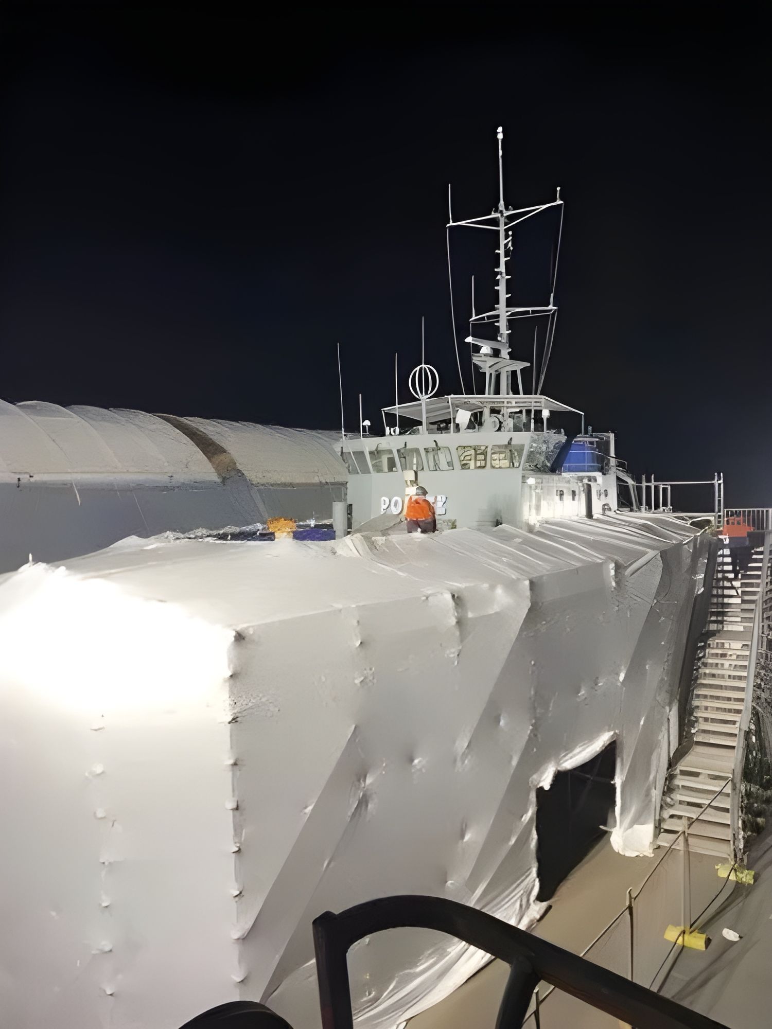 Construction Site Enveloped in White Synthetic Plastic Sheeting — T & T Scaffolding in Gordonvale, QLD