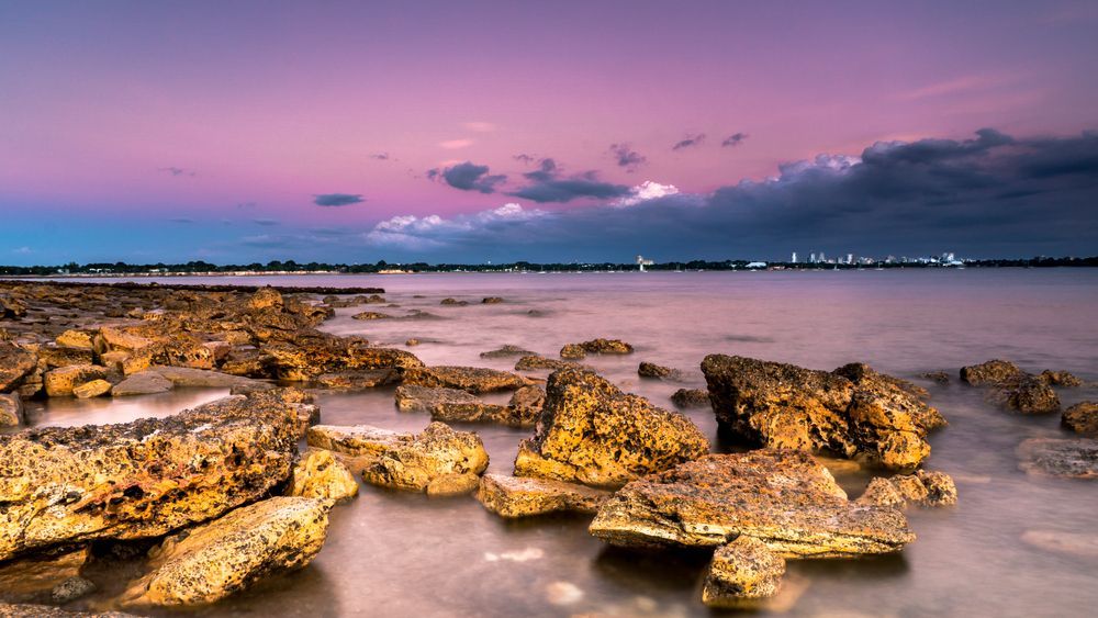 Darwin Beach with Forms of Rocks on the Water — T & T Scaffolding in Darwin, NT