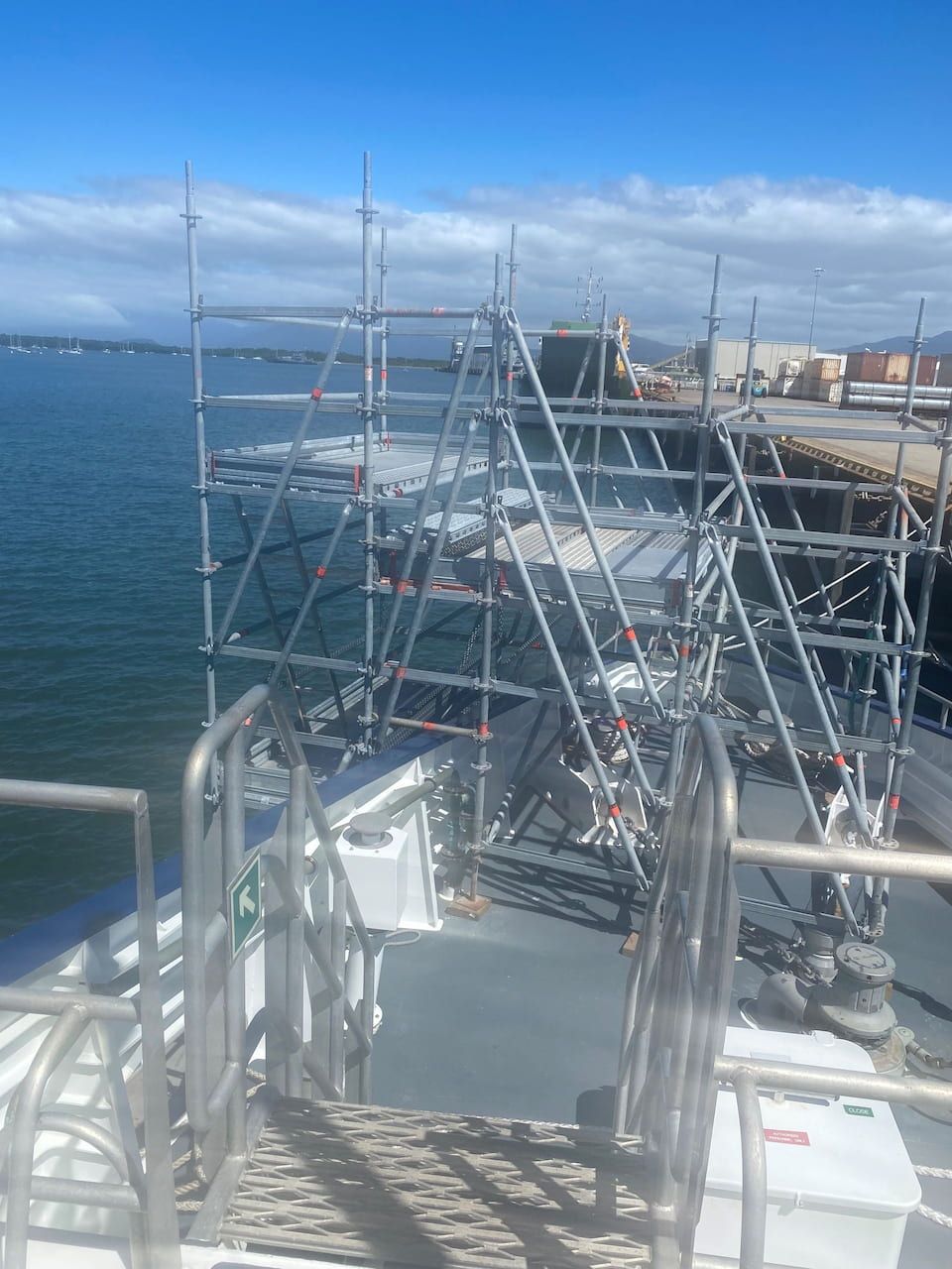 Stairs Leading Up To A Boat With Scaffolding On It — T & T Scaffolding in Gordonvale, QLD