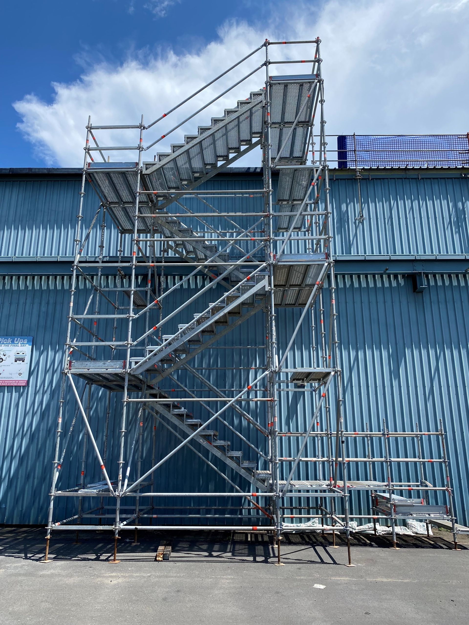 Scaffolded Construction Worker — T & T Scaffolding in Gordonvale, QLD