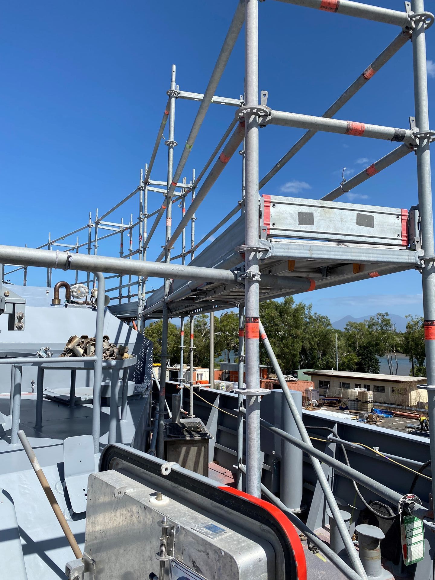 A Staircase Is Being Built with Scaffolding Around It — T & T Scaffolding in Gordonvale, QLD